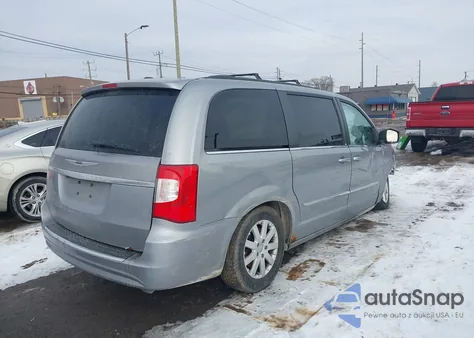 2013 Chrysler Town & Country Touring z USA, uszkodzony, nr VIN 2C4RC1BG7DR620791